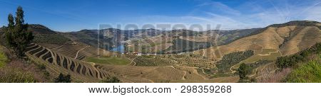 Panoramic View Of The Pinhao Village With Terraced Vineyards And The Douro River, In Portugal; Conce