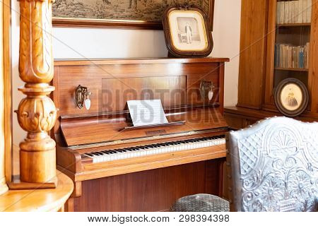 Radun Castle, Czech Republic, 7 April 2019 - Old Wooden Piano In Piano Room In Castle Style