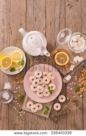Canestrelli Biscuits With Mint On Wooden Table.