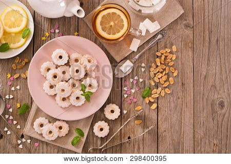 Canestrelli Biscuits With Mint On Wooden Table.