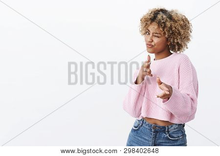 Hey You, Bang. Joyful And Charismatic Good-looking Emotive African Woman With Blond Curly Haircut Wi