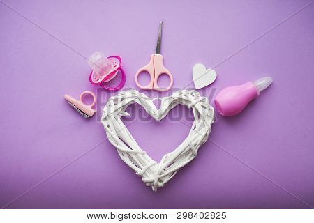 Newborn Baby Story. Strow Heart And Childrens Toys, Scissors, Baby Bottle, Nipple, Hairbrush On Viol