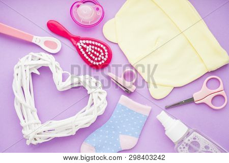 Newborn Baby Story. Strow Heart And Childrens Toys, Scissors, Baby Bottle, Nipple, Hairbrush On Viol