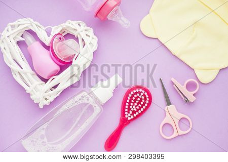 Newborn Baby Story. Strow Heart And Childrens Toys, Scissors, Baby Bottle, Nipple, Hairbrush On Viol