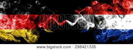 Germany Vs Paraguay, Paraguayan Smoky Mystic Flags Placed Side By Side. Thick Colored Silky Smoke Fl