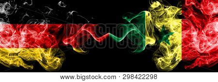 Germany Vs Senegal, Senegalese Smoky Mystic Flags Placed Side By Side. Thick Colored Silky Smoke Fla