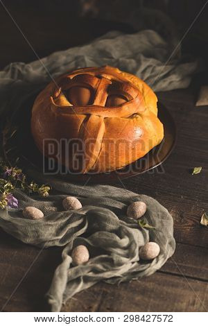 Easter Folar With Egg On Wooden Table Top.
