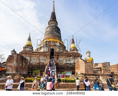 People Visiting The Temple Of Ayutthaya Historical Park On Thailand.