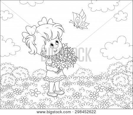 Cute Little Girl With A Bouquet Of Wildflowers Looking At A Flittering Butterfly On A Sunny Summer D