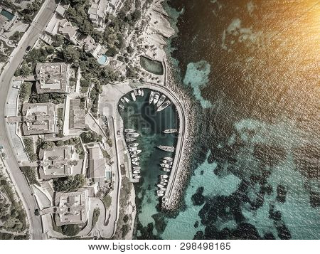 Beautiful birdeye view on the sea coastline with pier and yakhts at sunny day. Travell, jorney,islands, Seascape, freedom, holidays concept.