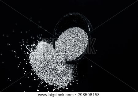 Close Up Of Clay Bowl On Wooden Surface Full Of Poppy Seeds Or Khus Or Opium Poppy Or Breadseed Popp