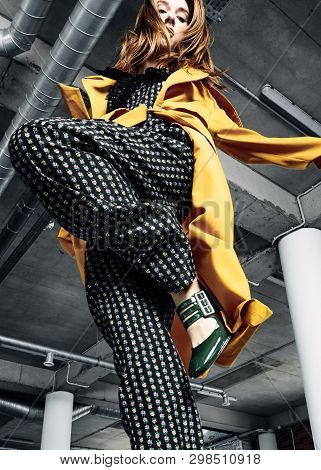 Young Woman In Flattering Coat
