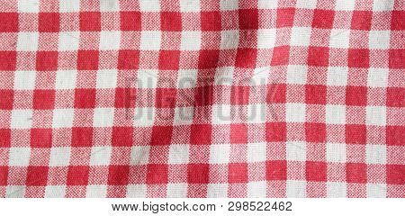 Red Linen Picnic Tablecloth. Texture Of Checkered Picnic Blanket.