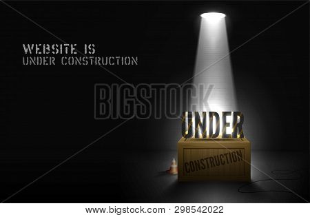 Poster Under Construction N Wood Box In Spotlight On Darkness Background. Website Coming Soon Banner