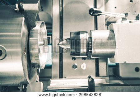 Metal Working Lathe Machine Closeup. Processing Metallic Material.