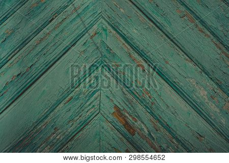 Background Of Green Flaky Wood
Backdrop Of Green Colored Wooden Panels With Aged Flaky Surface