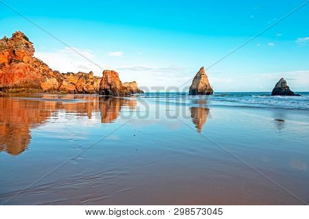 Praia Tres Irmaos in Alvor in the Algarve Portugal at sunset
