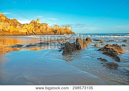 Praia Tres Irmaos in Alvor in the Algarve Portugal at sunset