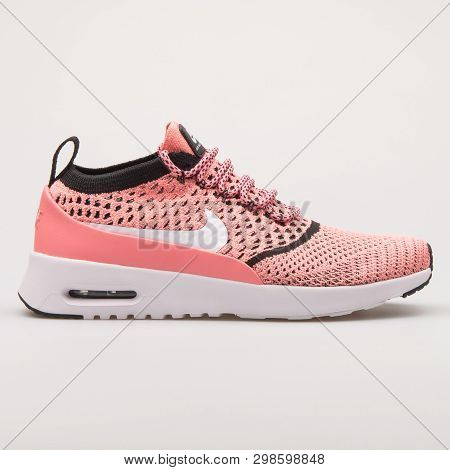 Vienna, Austria - August 23, 2017: Nike Air Max Thea Ultra Flyknit Pink Sneaker On White Background.