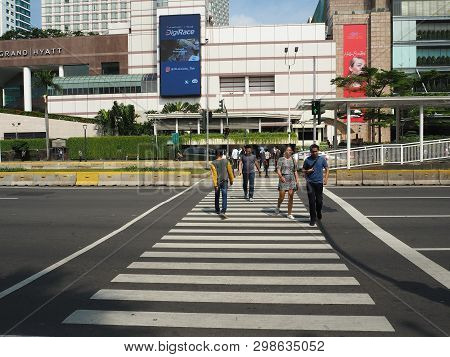 Jakarta, Indonesia - April 17, 2019: The Pelican Crossing On Jalan Thamrin Around Bundaran Hotel Ind