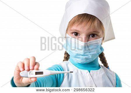 Close Up Landscape Photo Of Young Female Doctor With The Madical Mask Holding Electronic Thermometer