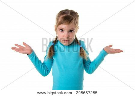 Serious Sad Girl In Pose With Hands Spread Aside And Palms Up. Have Nothing, Dont Know Sign