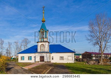Milkovo, Kamchatka, Russia- 27 September 2014: View Of The Wooden, New Orthodox Church In Milkovo. T