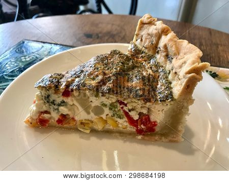 Quiche Tart Kis / Vegetable Pie Slice Served With Plate At Restaurant.