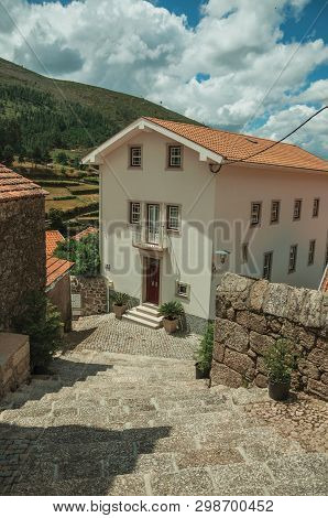 Two-story House At The End Of Deserted Alley On Slope With Steps, In A Sunny Day At Alvoco Da Serra.