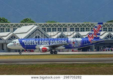 Airplane Taxiing On Runway