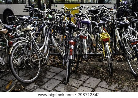 Amsterdam,netherlands - September 06, 2018: Sunset In Amsterdam.bicycle Parking And Traditional Old