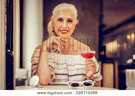 Smiling Grey-haired Woman With Red Lips Wearing Off-shoulder Blouse