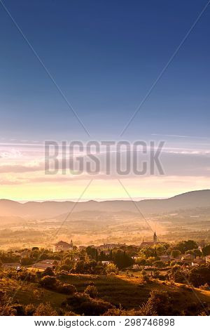 French Town Of Barjac, Hilly Mediterranean Landscape At Sunset, South France, Europe