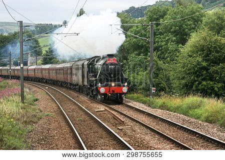 Black Five Steam Locomotive Number 45407 At Cononley On The Waverley Express Charter Train 8th Augus