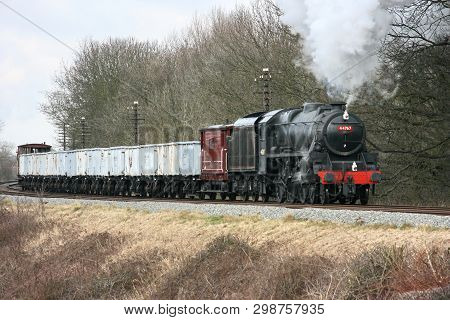 Black Five Steam Loco Number 44767 With Windcutter Freight Train At The Great Central Railway Herita