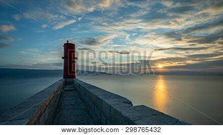 Red Lighthouse Of Cres (croatia) On A Sunny Evening In Spring, Sunset