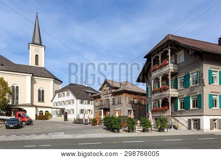 Alberschwende, Austria - October 18, 2018. Main Village Square With Old Parish Church Of Saint Marti