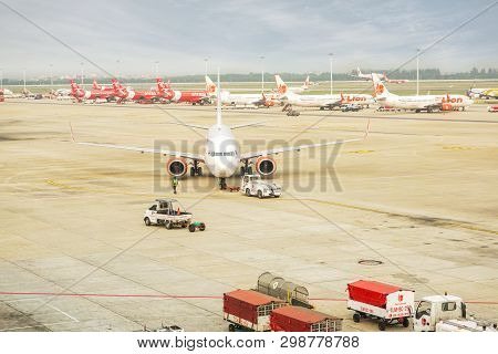 Bangkok, Thailand 11 February 2018 : Aircraft Pushbacks Tractor Dragging The Plane Of Thai Lion Air 