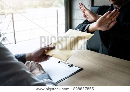 Anti Bribery And Corruption Concept, Business Man Refusing And Don't Receive Money Banknote In Envel