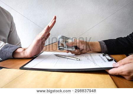 Anti Bribery And Corruption Concept, Business Man Refusing And Don't Receive Money Banknote In Envel