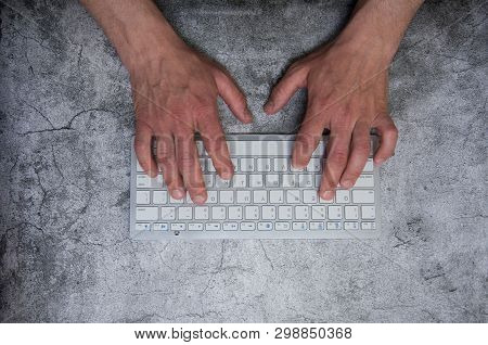 Keyboard With Hands On A Dark Gray Background.
Asphalt Concrete. Context, Writer, Programmer, Office