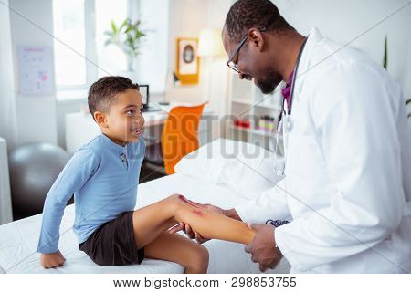 Cute Little Boy Visiting Pediatrician After Scratching His Leg