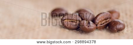 Cloceup Of Brown Roasted Coffee Beans Seeds On Burlap Textile Background Black Caffeine Drink And En
