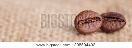 Cloceup Of Brown Roasted Coffee Beans Seeds On Burlap Textile Background Black Caffeine Drink And En