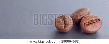 Cloceup Of Brown Roasted Coffee Beans Seeds On The Dark Background Black Caffeine Drink And Energy M