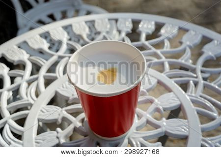 Beautiful Red Paper Cup With Latte In Spring