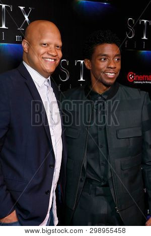 LAS VEGAS - APR 2:  Logan Cole, Chadwick Boseman at the 2019 CinemaCon - STX films at Caesars Palace on April 2, 2019 in Las Vegas, NV