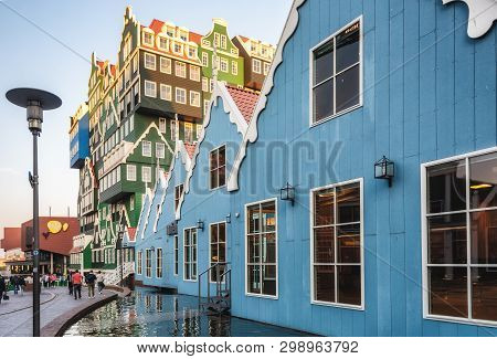 Zaandam, The Netherlands, April 18, 2019: The Famous Inntel Hotel In The Center Of Zaandam With On T