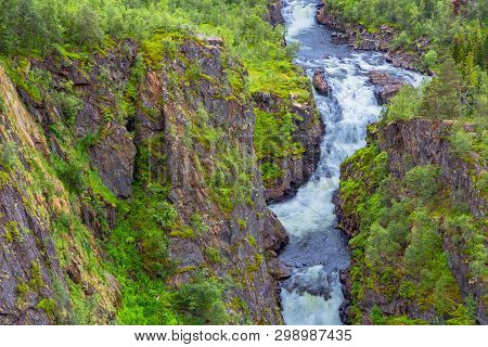 Falls In Mountains Of Norway. Waterfall Voringfossen - The Fourth Highest Peak In Norway. Voringsfos