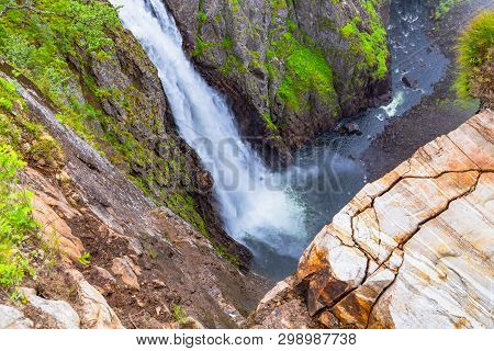 Falls In Mountains Of Norway. Waterfall Voringfossen - The Fourth Highest Peak In Norway. Voringsfos